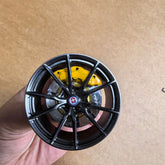 HRE style mini wheel & brake caliper car air freshener, angled view showing brake caliper and spokes – RimLabs