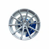 WF CF3 style mini wheel & brake caliper car air freshener on vent clip, front face view – RimLabs