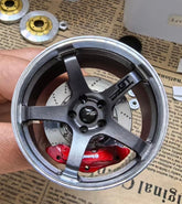 Advan GT style mini wheel & brake caliper car air freshener, angled view showing brake caliper and spokes – RimLabs