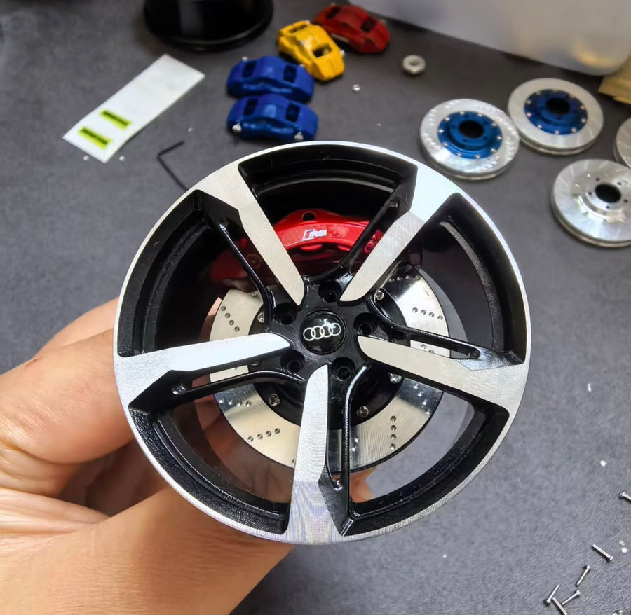 Audi RS style mini wheel & brake caliper car air freshener on vent clip, front face view – RimLabs