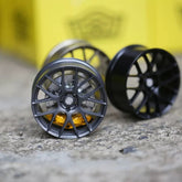 REV-7 style mini wheel & brake caliper car air freshener, angled view showing brake caliper and spokes – RimLabs