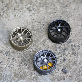 REV-7 style mini wheel & brake caliper car air freshener, close-up detail of caliper and rim – RimLabs